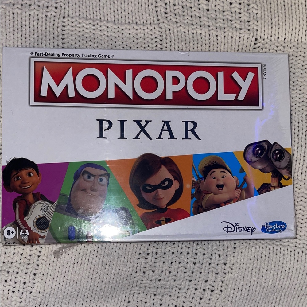 Hasbro Monopoly Pixar Edition with Red and Blue Accents